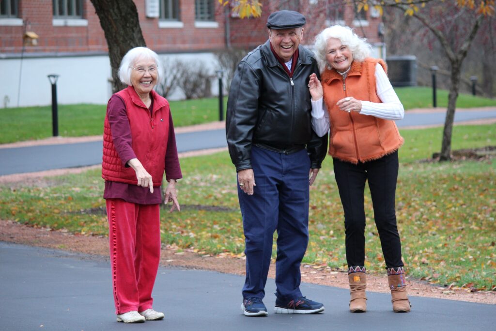 Three Pillars residents enjoying a walk outdoors