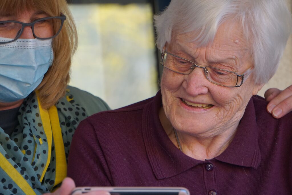 senior living resident with caretaker