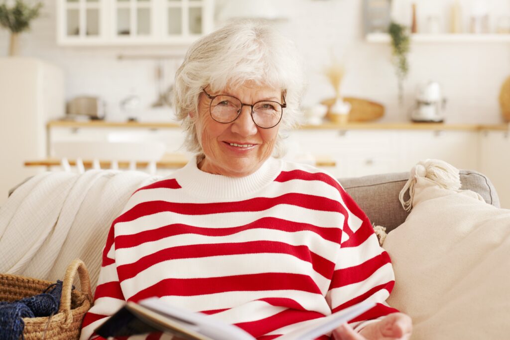 older adult woman reading