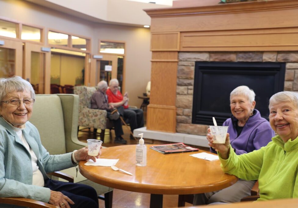 Three Pillars residents spending time together in a common area