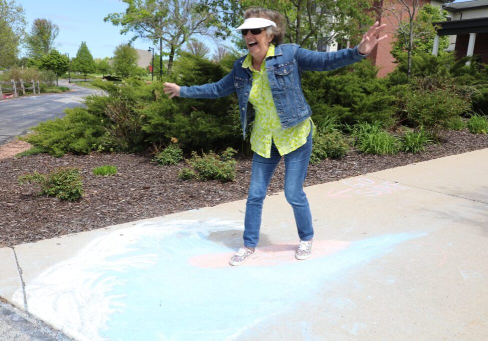 older woman exercising outdoors