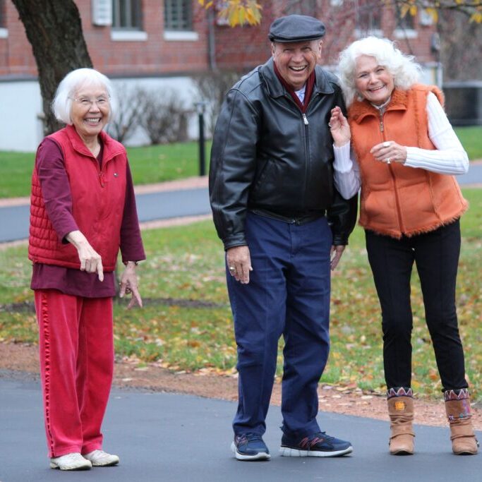 Three Pillars residents enjoying a walk outdoors