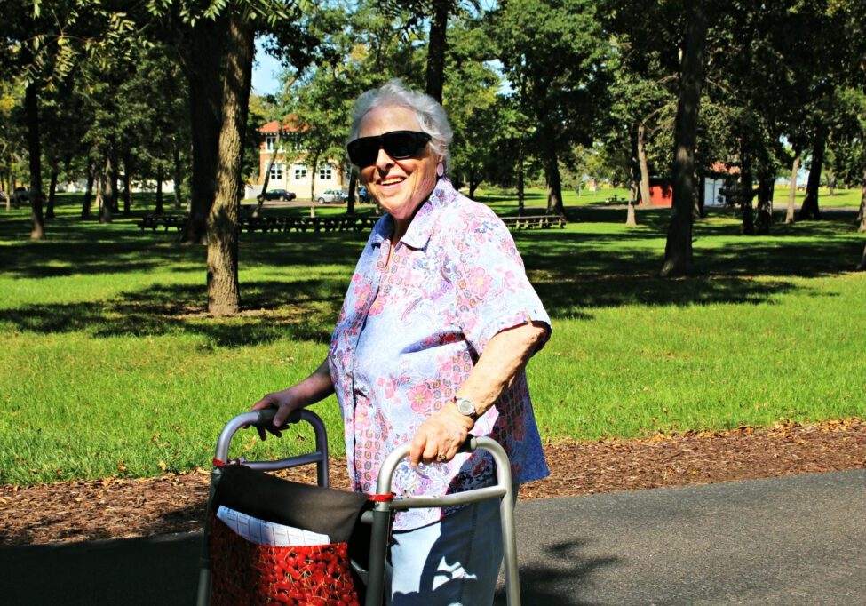 Older adult woman walking outdoors