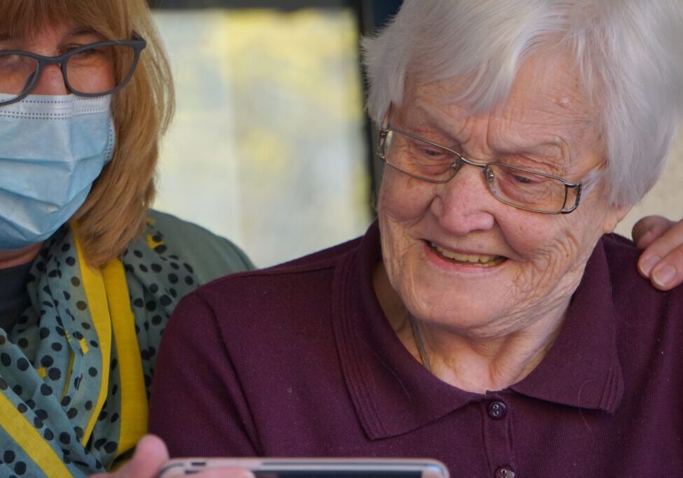 senior living resident with caretaker