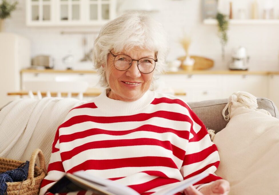 older adult woman reading