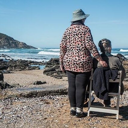 older adults on a beachfront