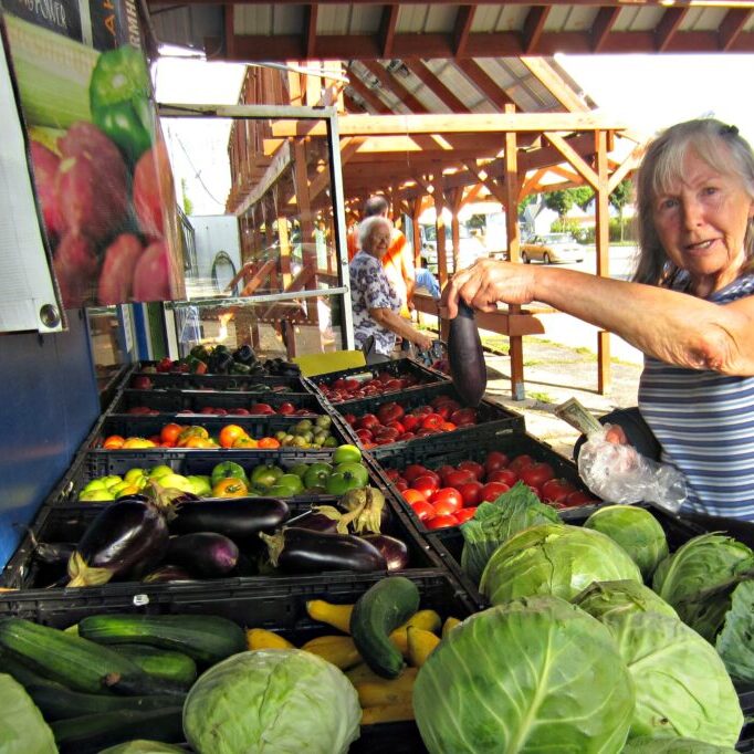 Older adult shopping for produce